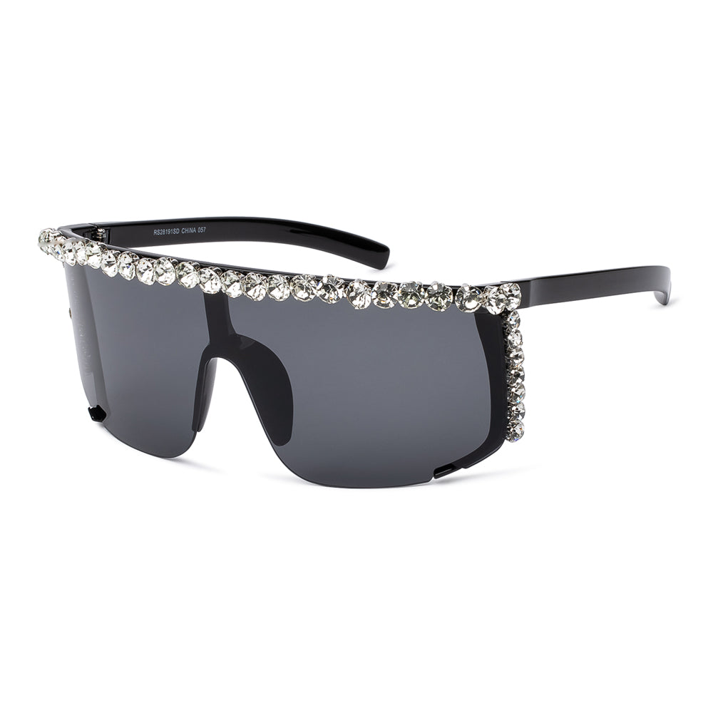 A pair of stylish shield sunglasses featuring a sleek design embellished with rhinestones. The frame is bold and fashionable, making them suitable for ladies looking to make a statement. Ideal for summer wear, these sunglasses are part of a new collection for 2024.